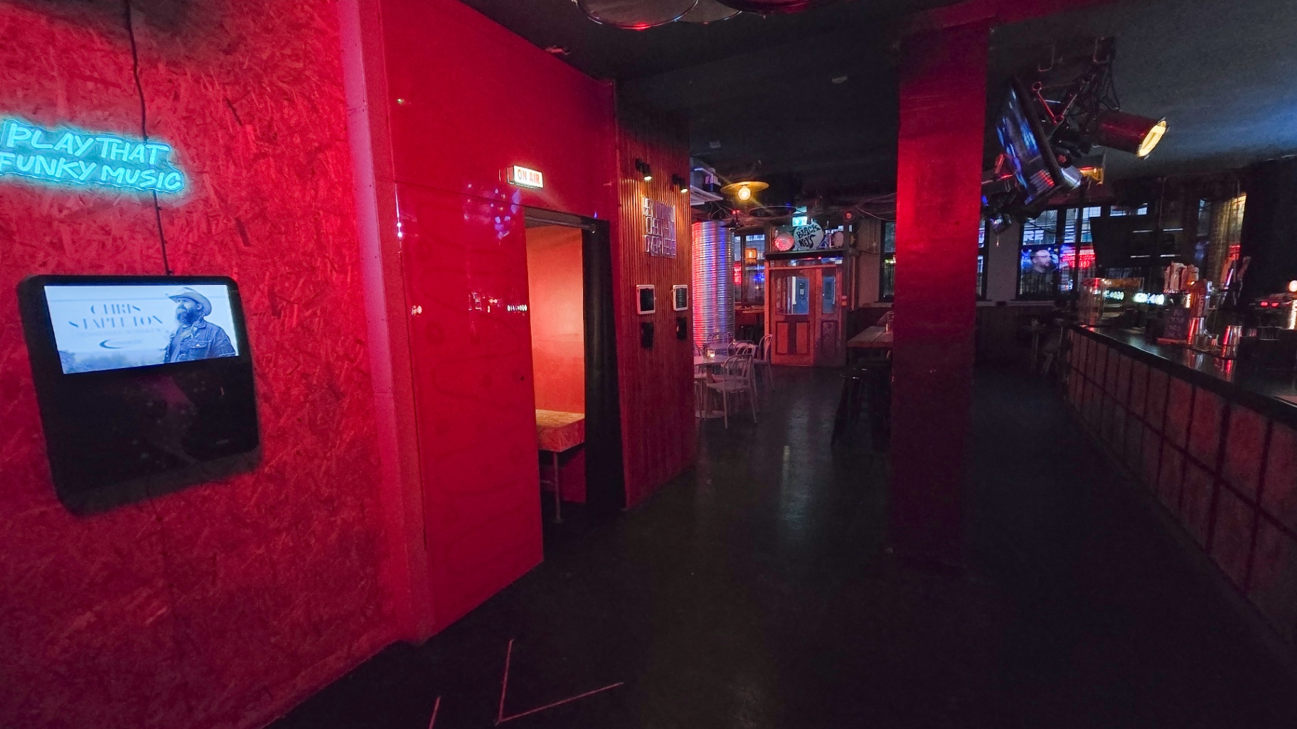 Entrance corridor with Play That Funky Music neon